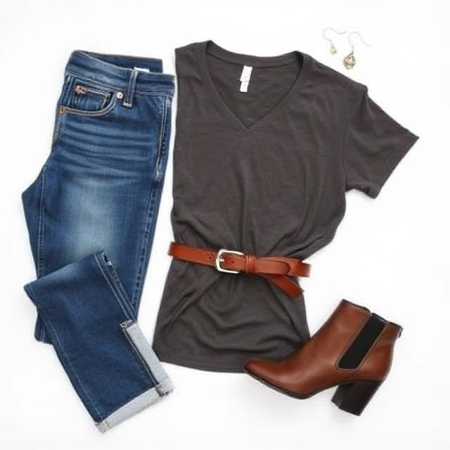 Effortless Outfit Inspiration for Every Season and Celebration 10 A flat lay of outfit essentials: jeans, a tee, ankle boots, belt, and earrings.