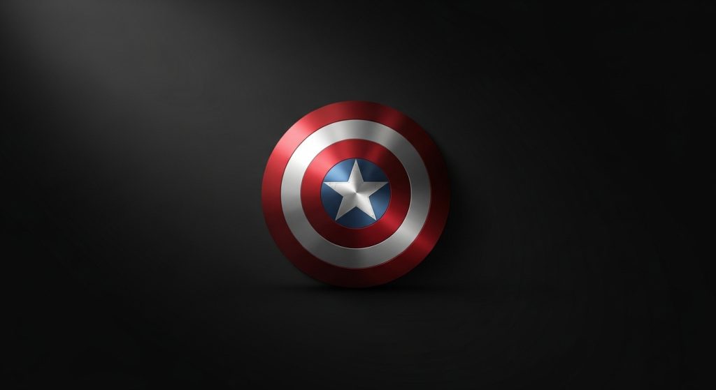 Aesthetic Wallpaper Background Marvel Epic HD Superhero Backdrops 4 A minimalist wallpaper featuring Captain America’s shield on a matte black background with soft lighting, simple yet powerful, high-quality aesthetic design.