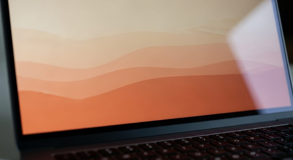 Aesthetic Mindful Living Wallpaper: A Digital Path to Calm 3 Aesthetic mindful living wallpaper with warm earthy gradients on laptop screen.