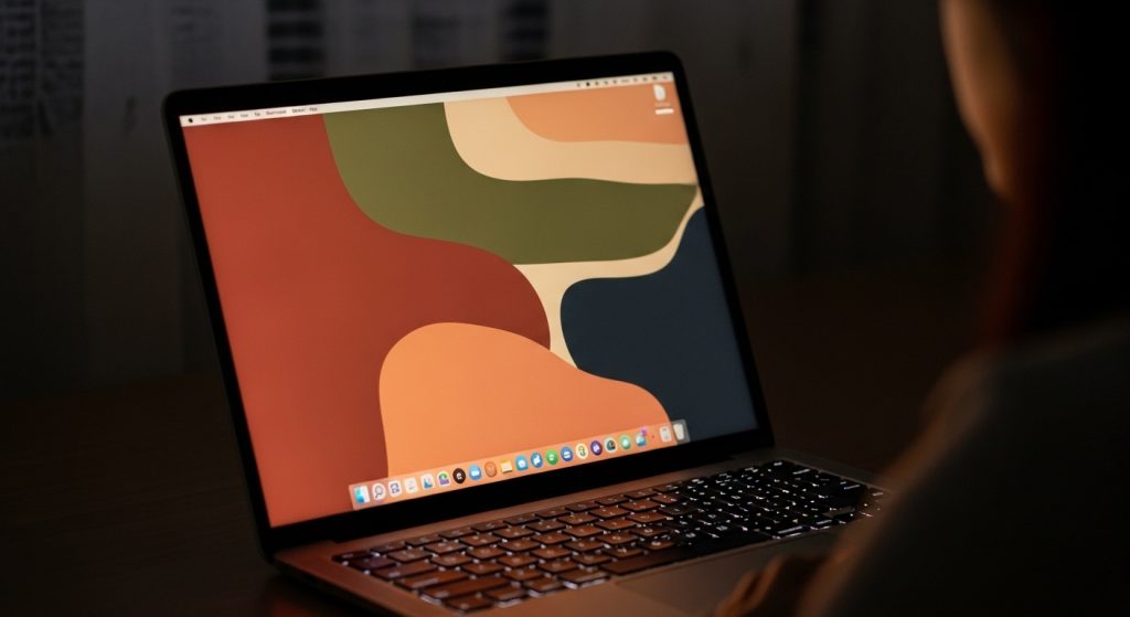 Aesthetic Mindful Living Wallpaper: A Digital Path to Calm 11 Laptop glowing with aesthetic mindful living wallpaper symbolizing peace.