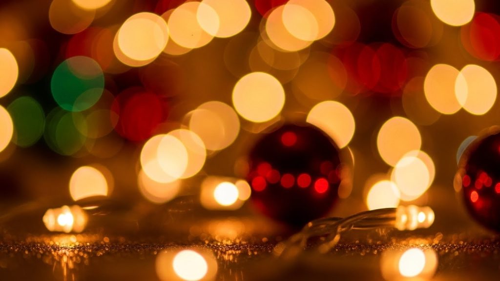 : Soft warm bokeh lights in Christmas colors.