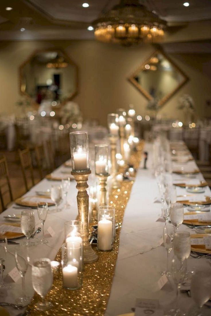 elegant special events celebration decor with candles flowers and luxury table styling