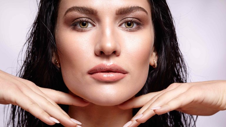 TikTok viral beauty trends featuring glowing skin soft glam makeup glossy lips and modern skincare aesthetic