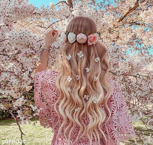 A beautiful spring hairstyle feature image showcasing soft waves, romantic braids, glossy layered haircuts, and feminine seasonal beauty trends. The fresh spring inspired look includes natural textures, floral aesthetics, healthy shine, and elegant hairstyles perfect for warm weather fashion and everyday style.