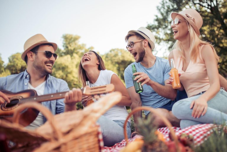 Friends celebrating together outdoors, sharing laughter and creating lasting memories during a friendship day gathering.
