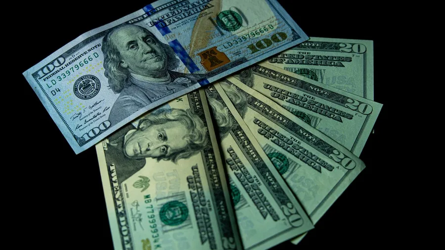Ecuador's dollar economy protects your check from swings